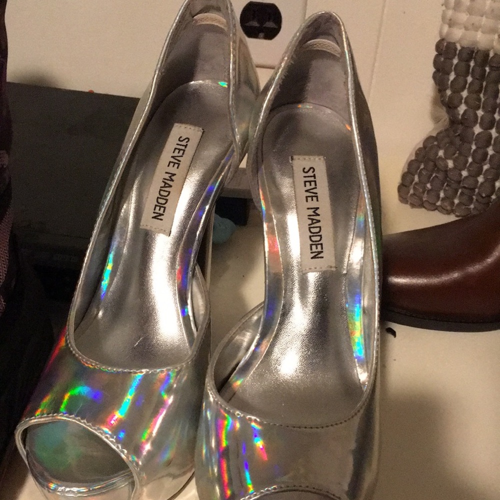 Steve Madden translucent patent leather peep toe shoe. Worn only a few times.
